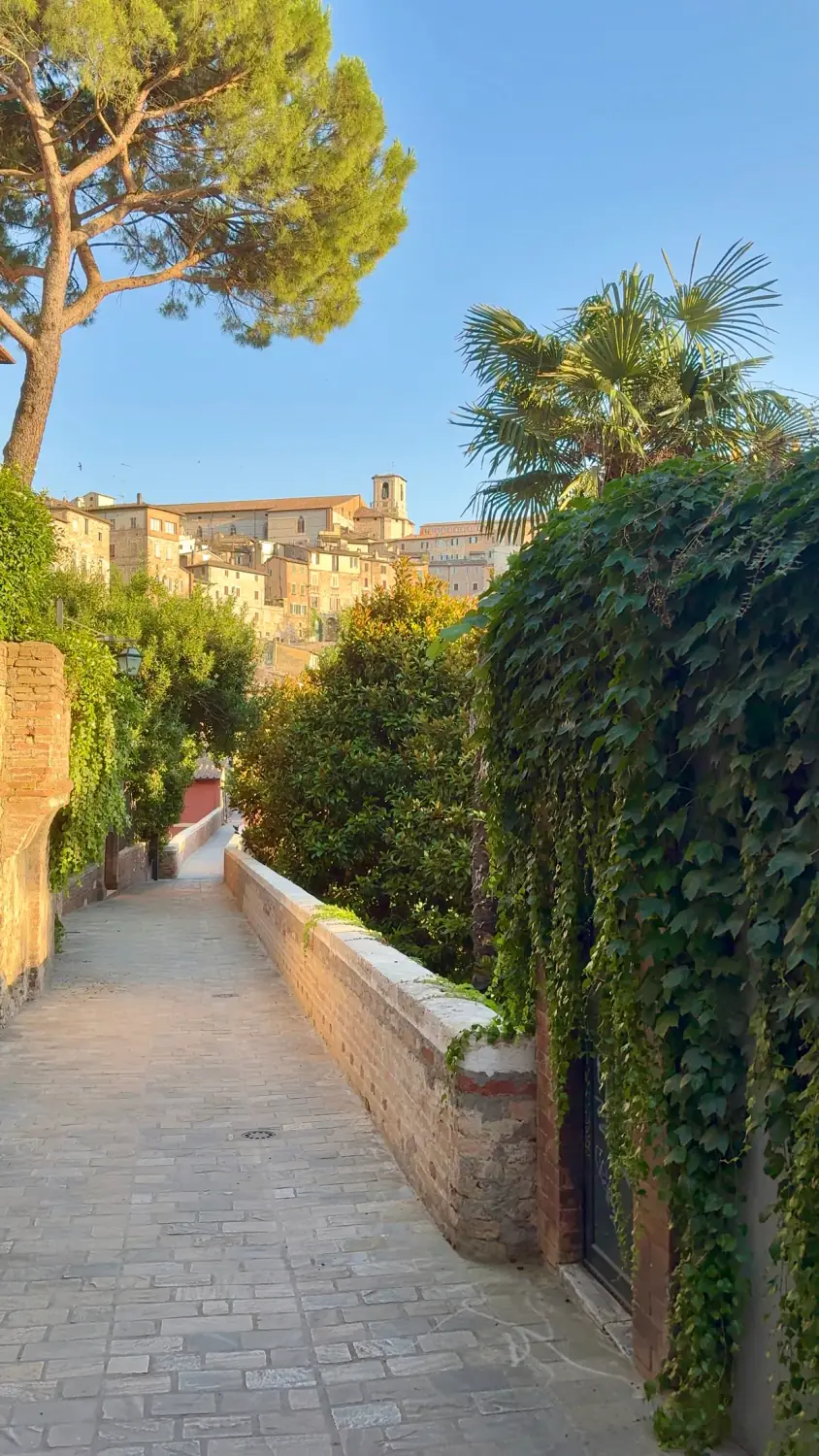 A green walkway towards the historic centre of Perugia